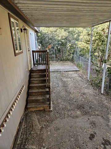 a view of backyard with green space