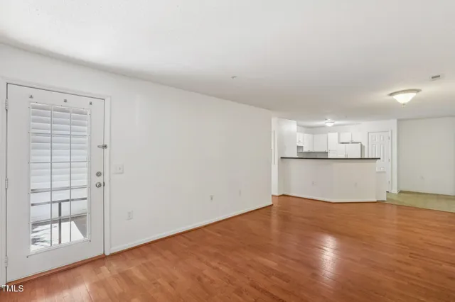 a kitchen with a stove sink and refrigerator