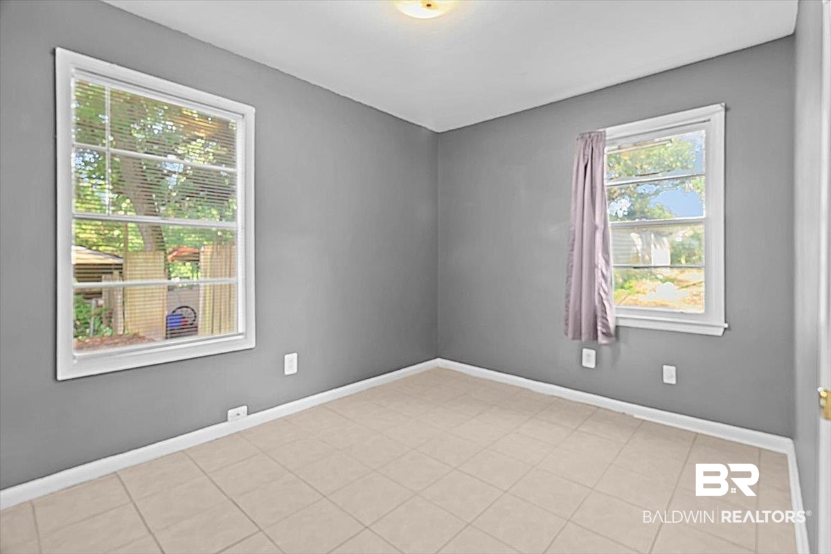 4918 Quimby Drive Mobile, AL 36619 - Photo 15 of 38 Spare room with baseboards