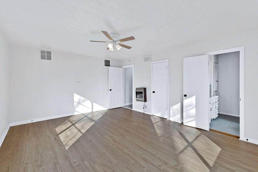 314 Fulton Street Denton, TX 76201 - Photo 14 of 29 a view of empty room with wooden floor