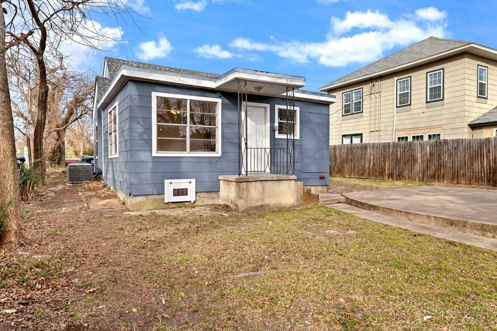 314 Fulton Street Denton, TX 76201 - Photo 22 of 29 a front view of a house with a yard