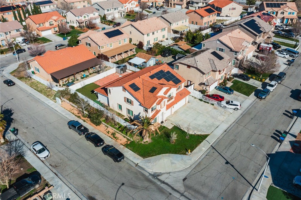 6323 Scalea Court Palmdale, CA 93552 - Photo 51 of 58 an aerial view of a city with lots of residential buildings