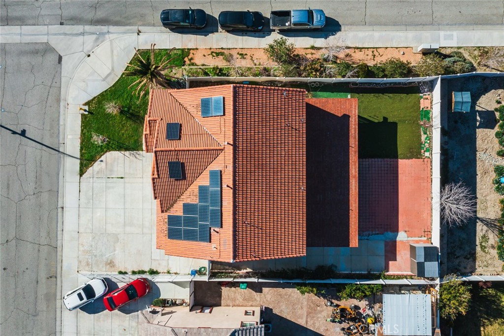 6323 Scalea Court Palmdale, CA 93552 - Photo 53 of 58 a bathroom with a sink and a mirror