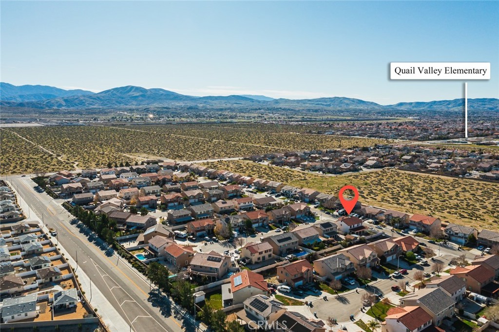 6323 Scalea Court Palmdale, CA 93552 - Photo 55 of 58 an aerial view of a city