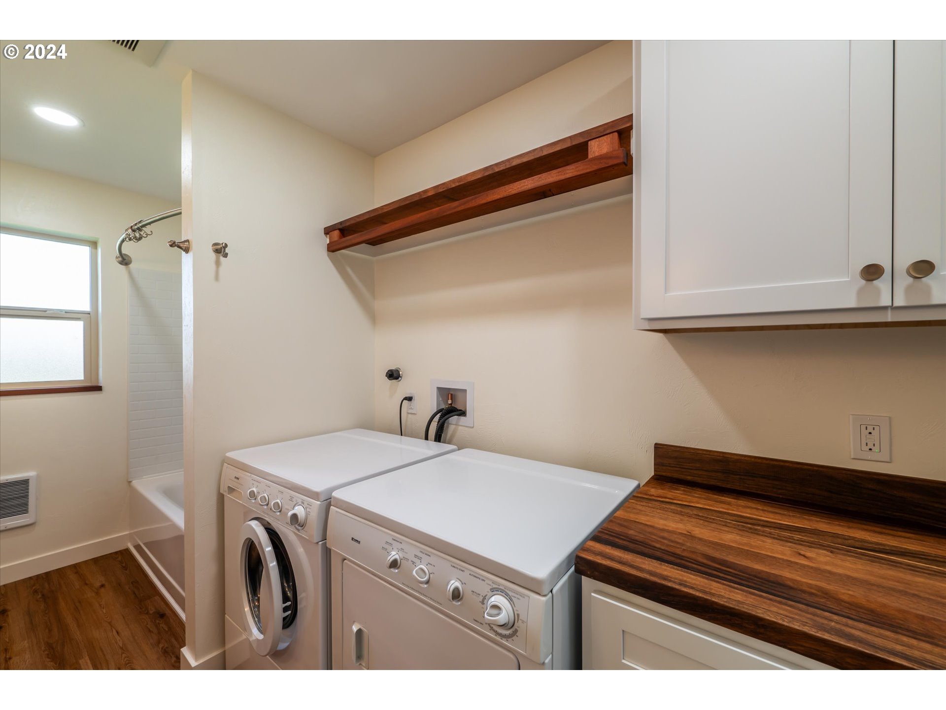 1190 Beach Loop Road Bandon, OR 97411 - Photo 30 of 39 a utility room with dryer and washer