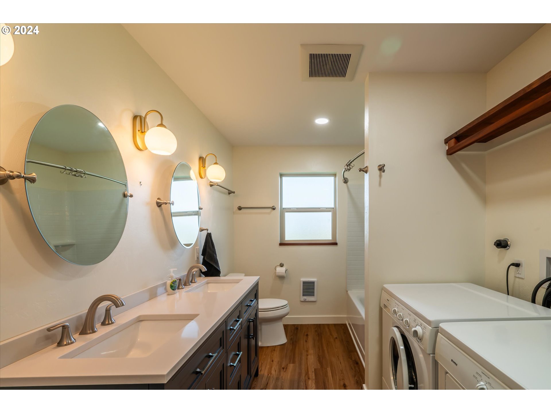 1190 Beach Loop Road Bandon, OR 97411 - Photo 31 of 39 a bathroom with a sink vanity granite and a mirror