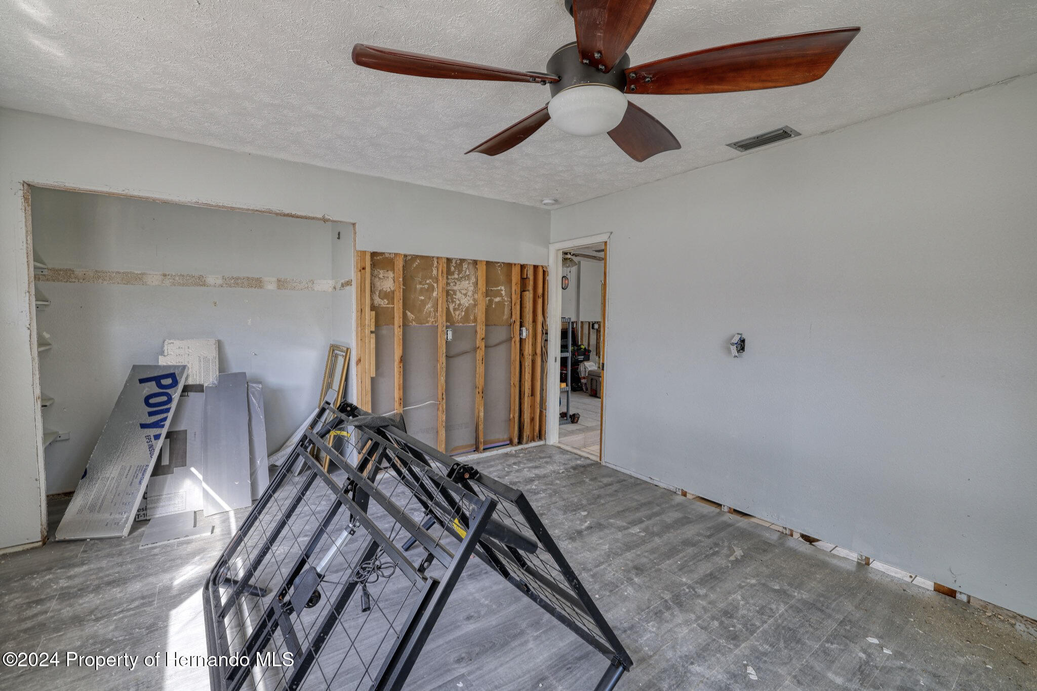 3186 Gulf Drive Aripeka, FL 34607 - Photo 16 of 19 a view of a room with gym equipment