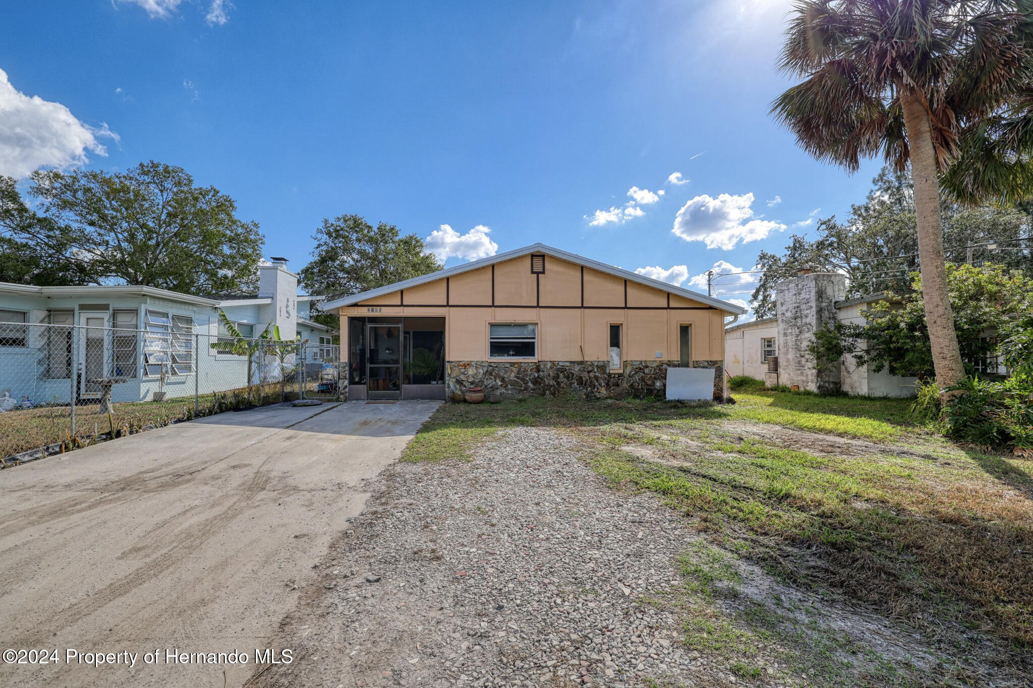 3186 Gulf Drive Aripeka, FL 34607 - Photo 8 of 19 a view of a house with a yard