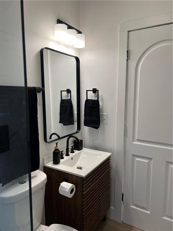 1474 Beecher Street Southwest Atlanta, GA 30310 - Photo 17 of 20 a bathroom with a sink and a mirror