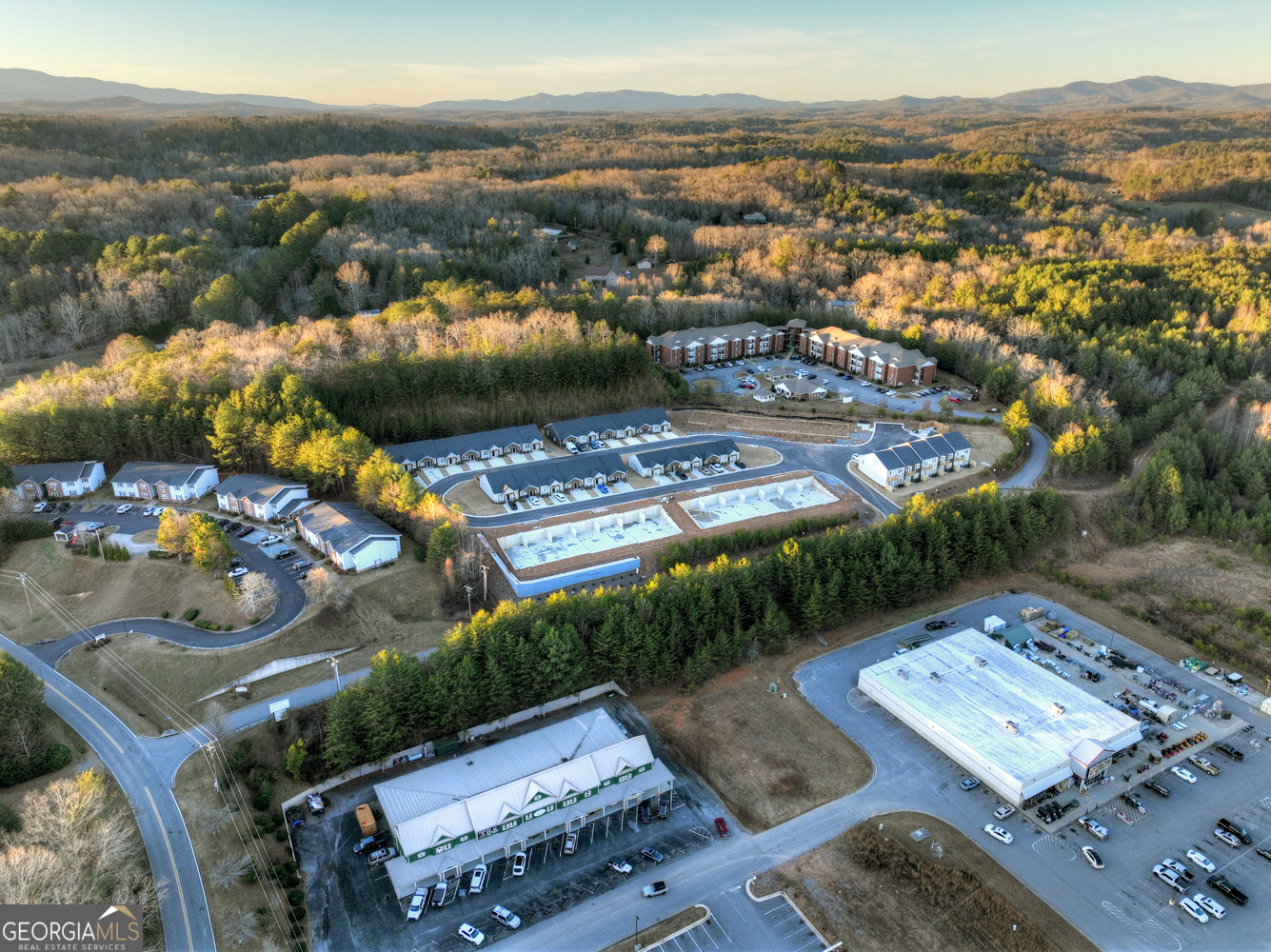0 Grove Loop, Unit 47 Blue Ridge, GA 30513 - Photo 11 of 26 an aerial view of a city with lots of residential buildings