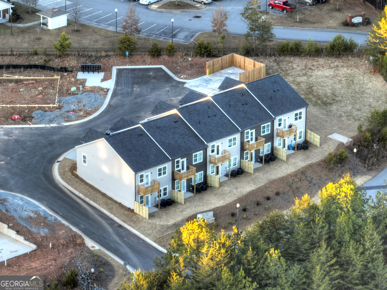 0 Grove Loop, Unit 47 Blue Ridge, GA 30513 - Photo 19 of 26 an aerial view of a house with swimming pool and large trees