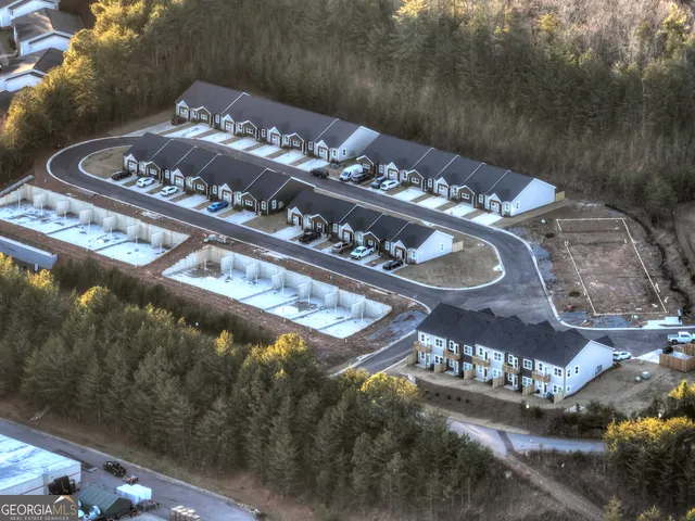 a view of swimming pool from a balcony