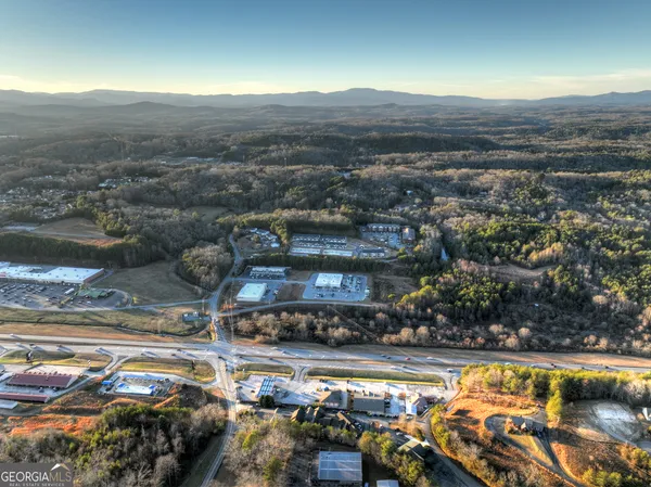 a view of a swimming pool with a lake view