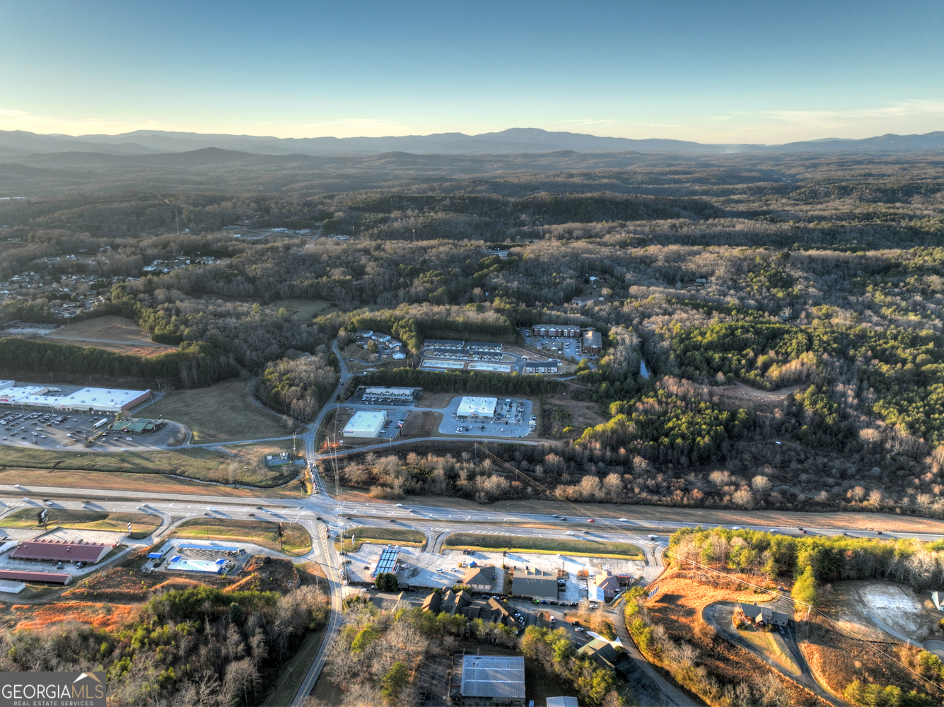 0 Grove Loop, Unit 47 Blue Ridge, GA 30513 - Photo 9 of 26 a view of a swimming pool with a lake view