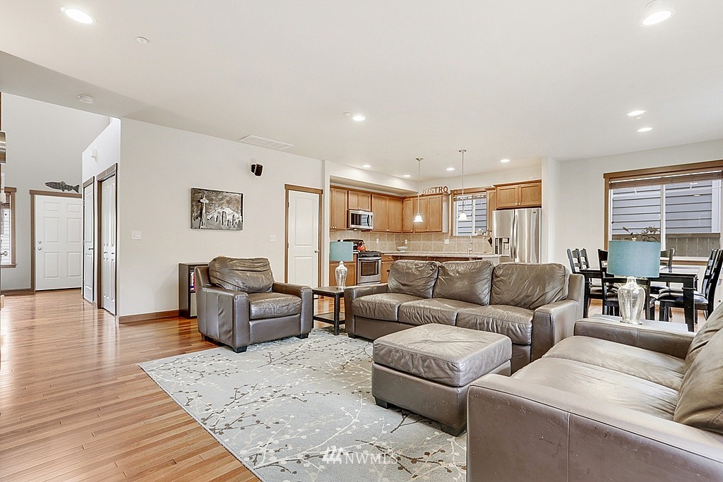 4733 Northeast 13th Place Renton, WA 98059 - Photo 6 of 20 a living room with furniture and a wooden floor
