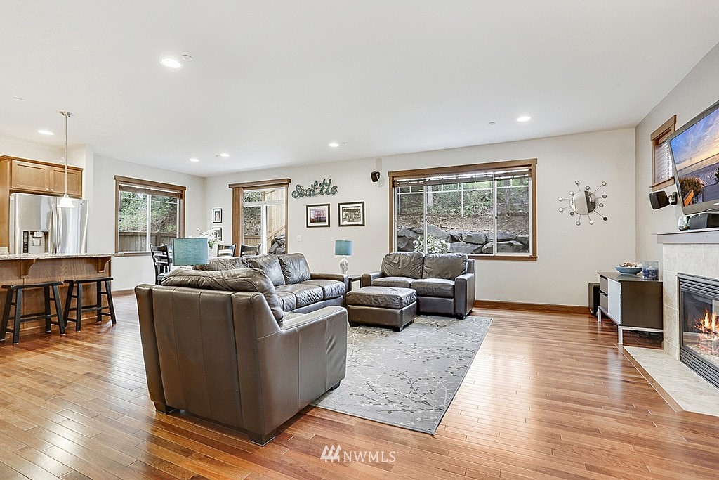 4733 Northeast 13th Place Renton, WA 98059 - Photo 8 of 20 a living room with furniture and a window