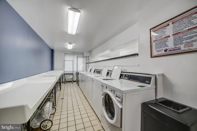 a view of a storage & utility room with washer and dryer