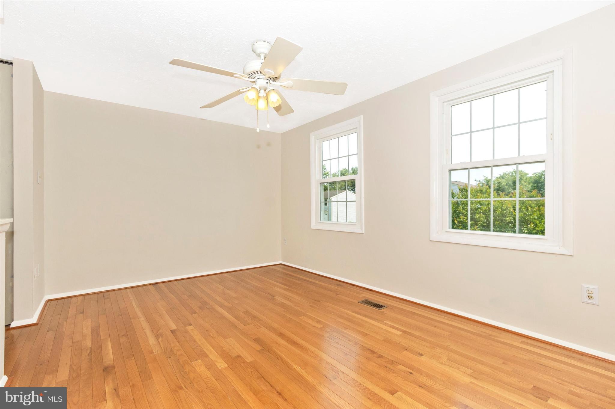 1432 Farmcrest Way Silver Spring, MD 20905 - Photo 11 of 20 Primary Bedroom with Vanity and Access to Bath