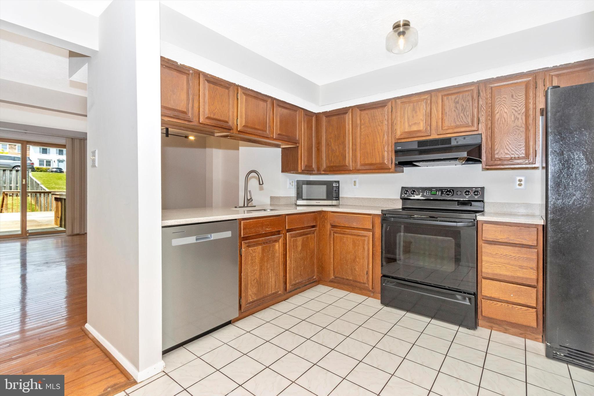 1432 Farmcrest Way Silver Spring, MD 20905 - Photo 3 of 20 Spacious Kitchen - Opening to Living/Dining Area