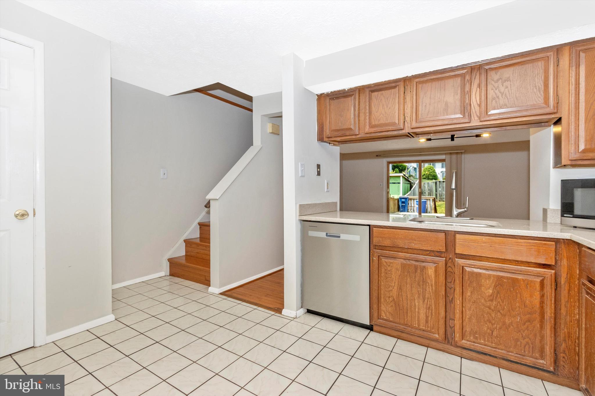 1432 Farmcrest Way Silver Spring, MD 20905 - Photo 4 of 20 Spacious Kitchen - Opening to Living/Dining Area