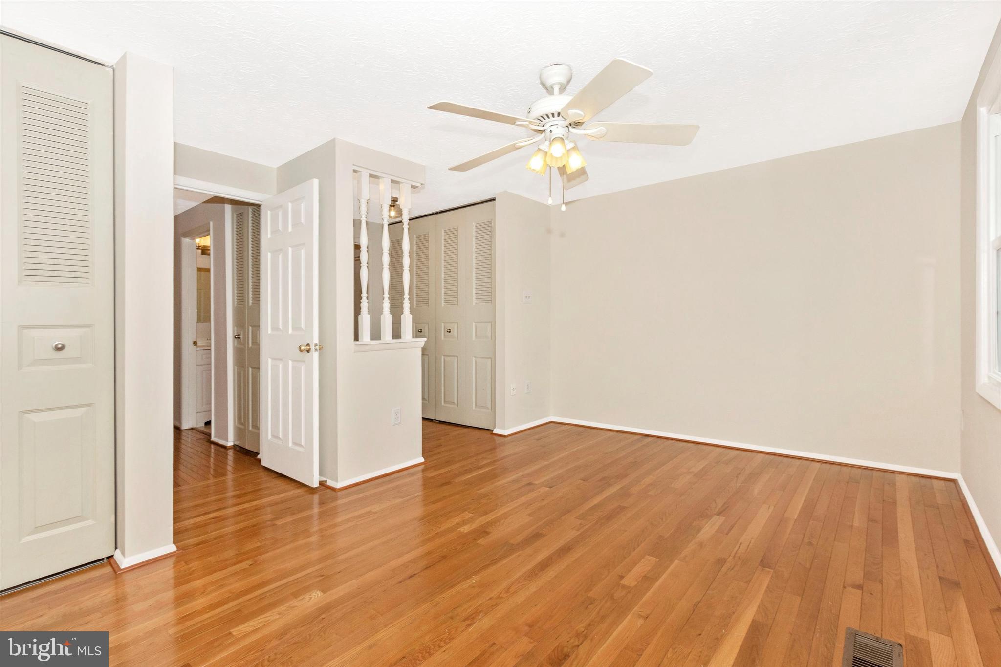 1432 Farmcrest Way Silver Spring, MD 20905 - Photo 10 of 20 Primary Bedroom with Vanity and Access to Bath