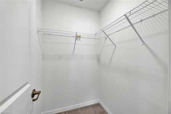 a bathroom with a sink and shower