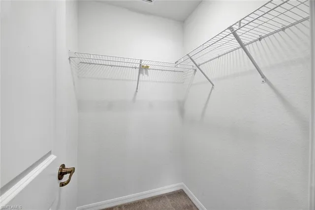 a bathroom with a sink and shower