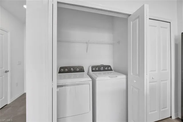 a view of front door of house and yard