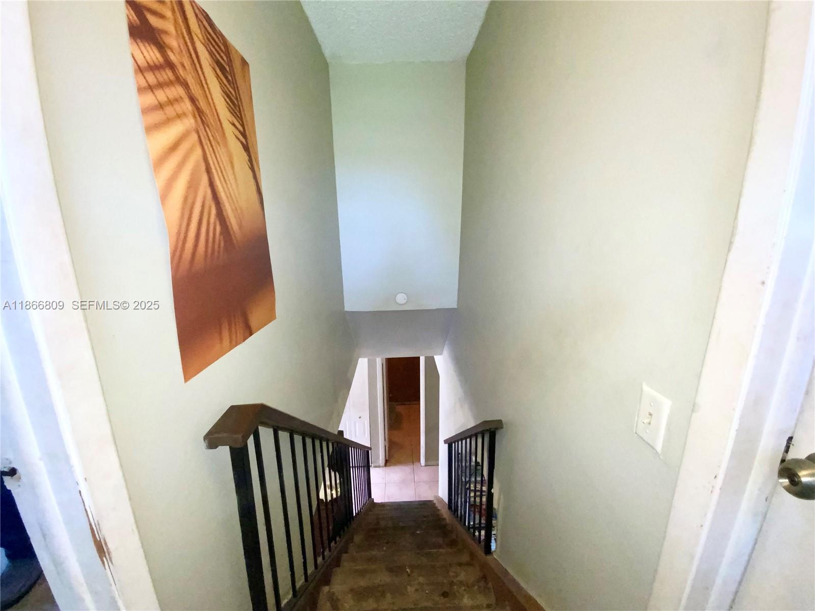 7024 Southwest 114th Place, Unit A52 Miami, FL 33173 - Photo 21 of 41 a view of balcony and door