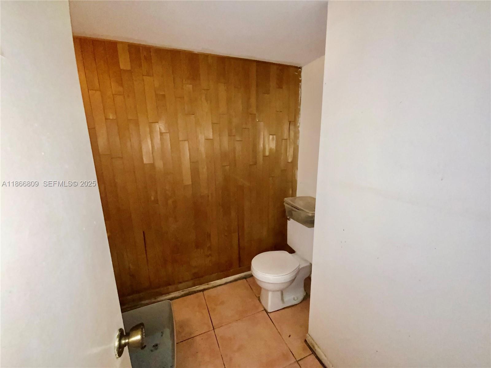 7024 Southwest 114th Place, Unit A52 Miami, FL 33173 - Photo 24 of 41 a bathroom with a sink and a toilet