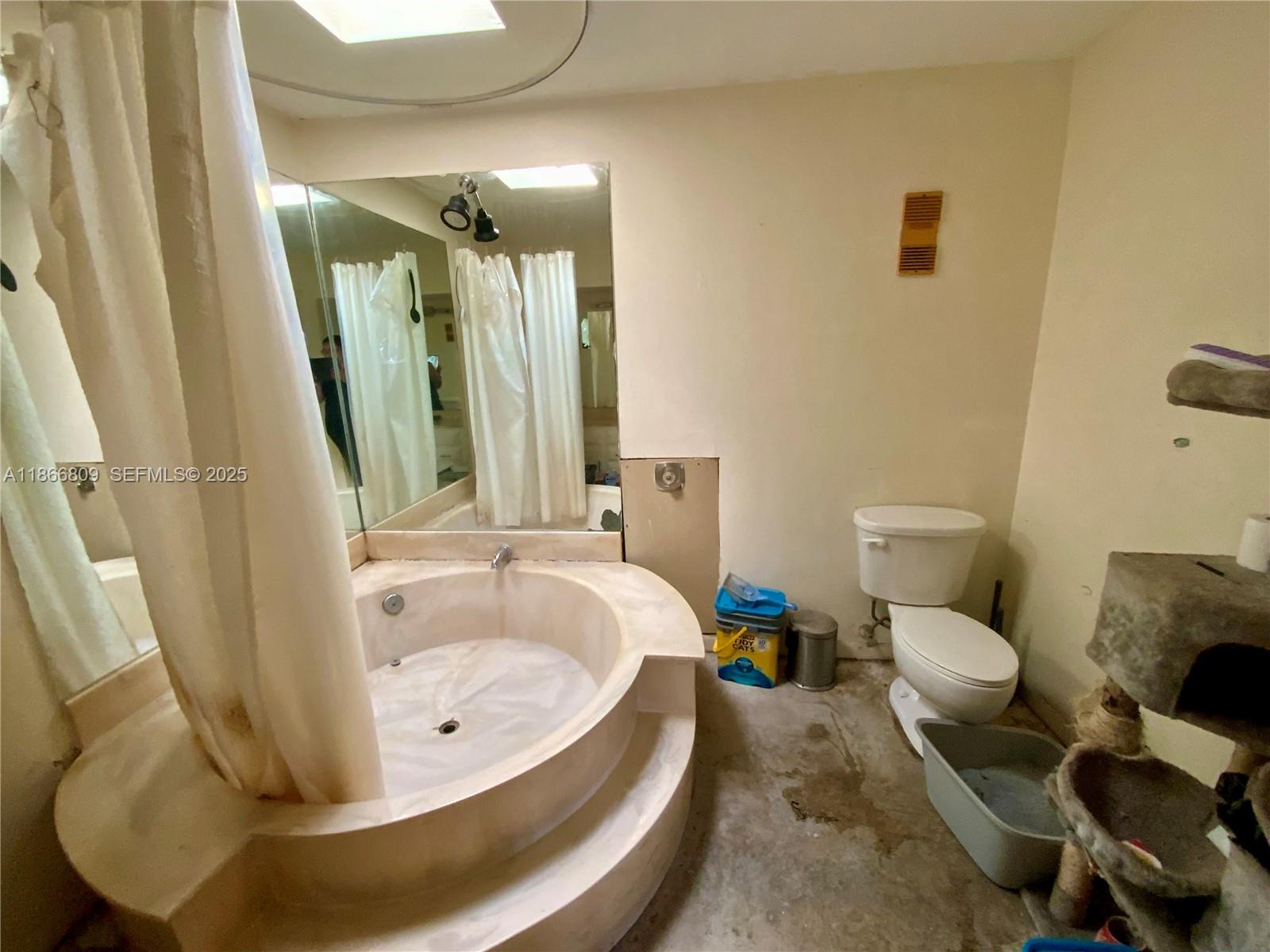 7024 Southwest 114th Place, Unit A52 Miami, FL 33173 - Photo 7 of 41 a bathroom with a tub and sink