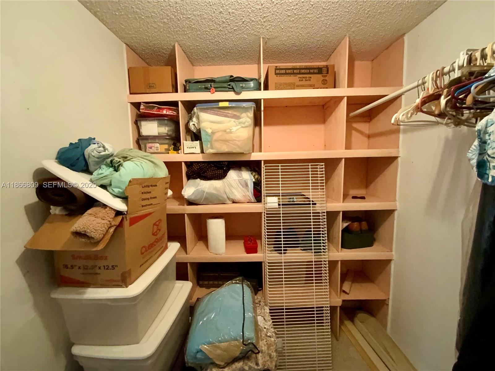 7024 Southwest 114th Place, Unit A52 Miami, FL 33173 - Photo 10 of 41 a view of furniture and storage