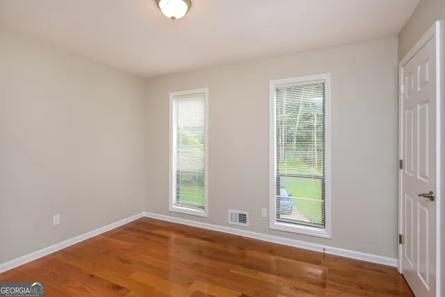 an empty room with window