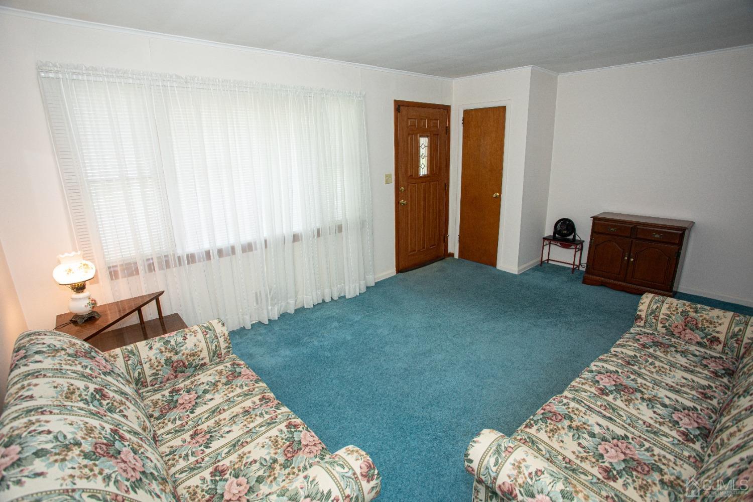 9 Becker Drive Sayreville, NJ 08859 - Photo 13 of 39 a bedroom with bed and window