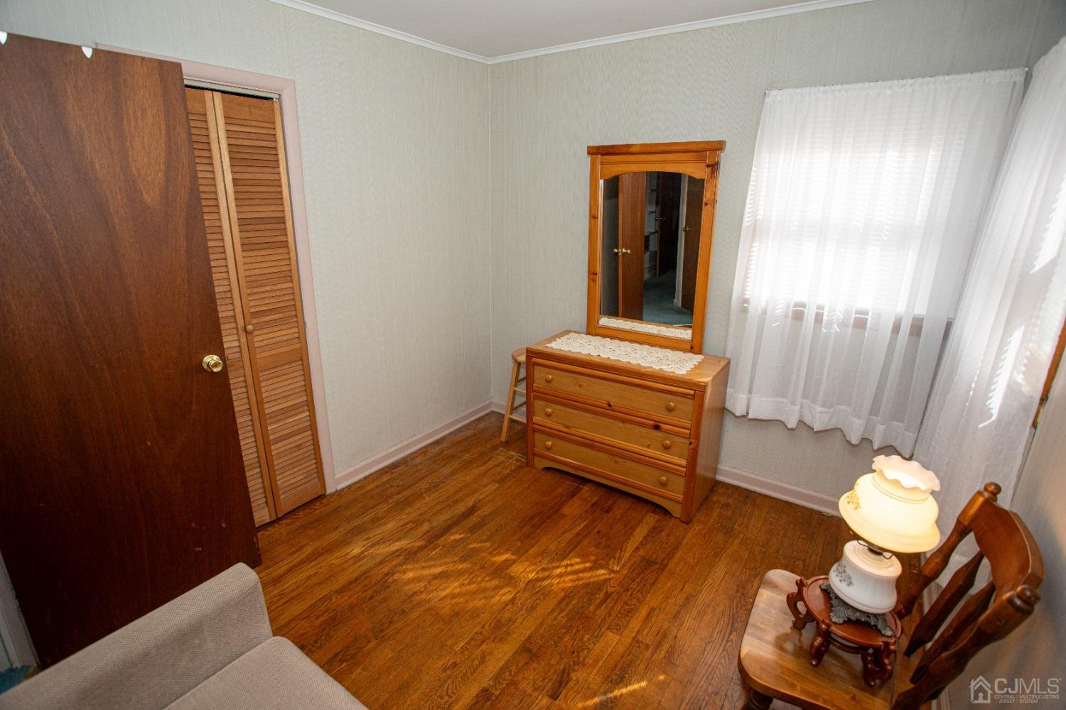 9 Becker Drive Sayreville, NJ 08859 - Photo 20 of 39 a view of a livingroom with furniture and a window