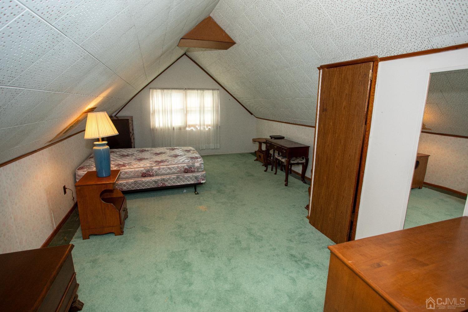 9 Becker Drive Sayreville, NJ 08859 - Photo 24 of 39 a en suite bathroom with sink and mirror