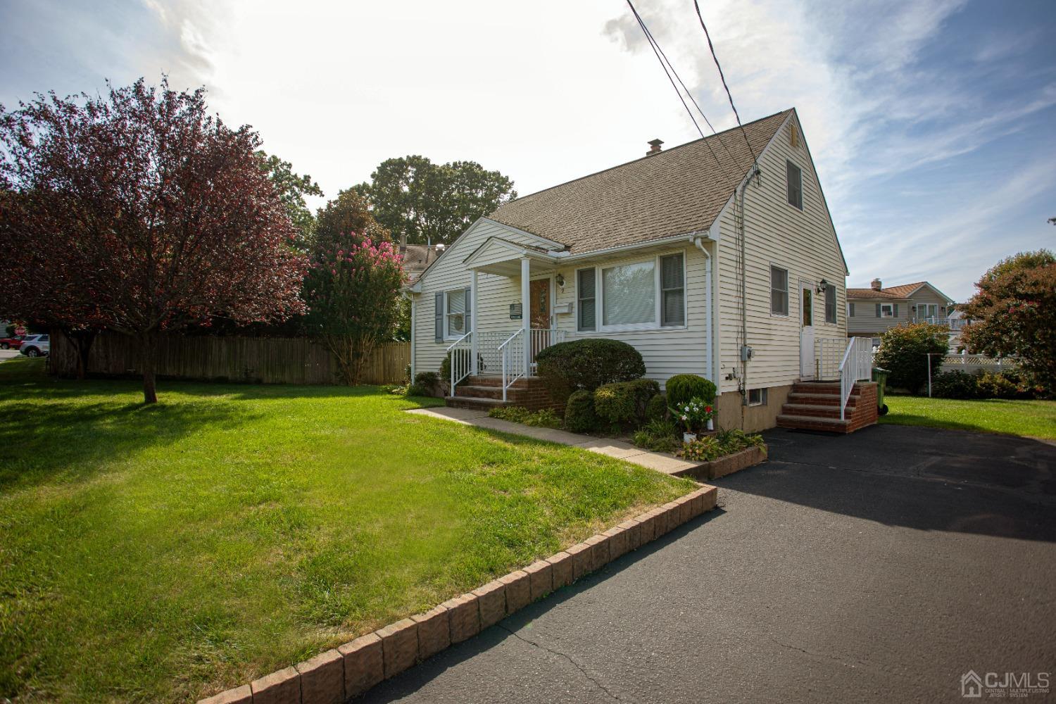 9 Becker Drive Sayreville, NJ 08859 - Photo 6 of 39 a view of a house with backyard and sitting area