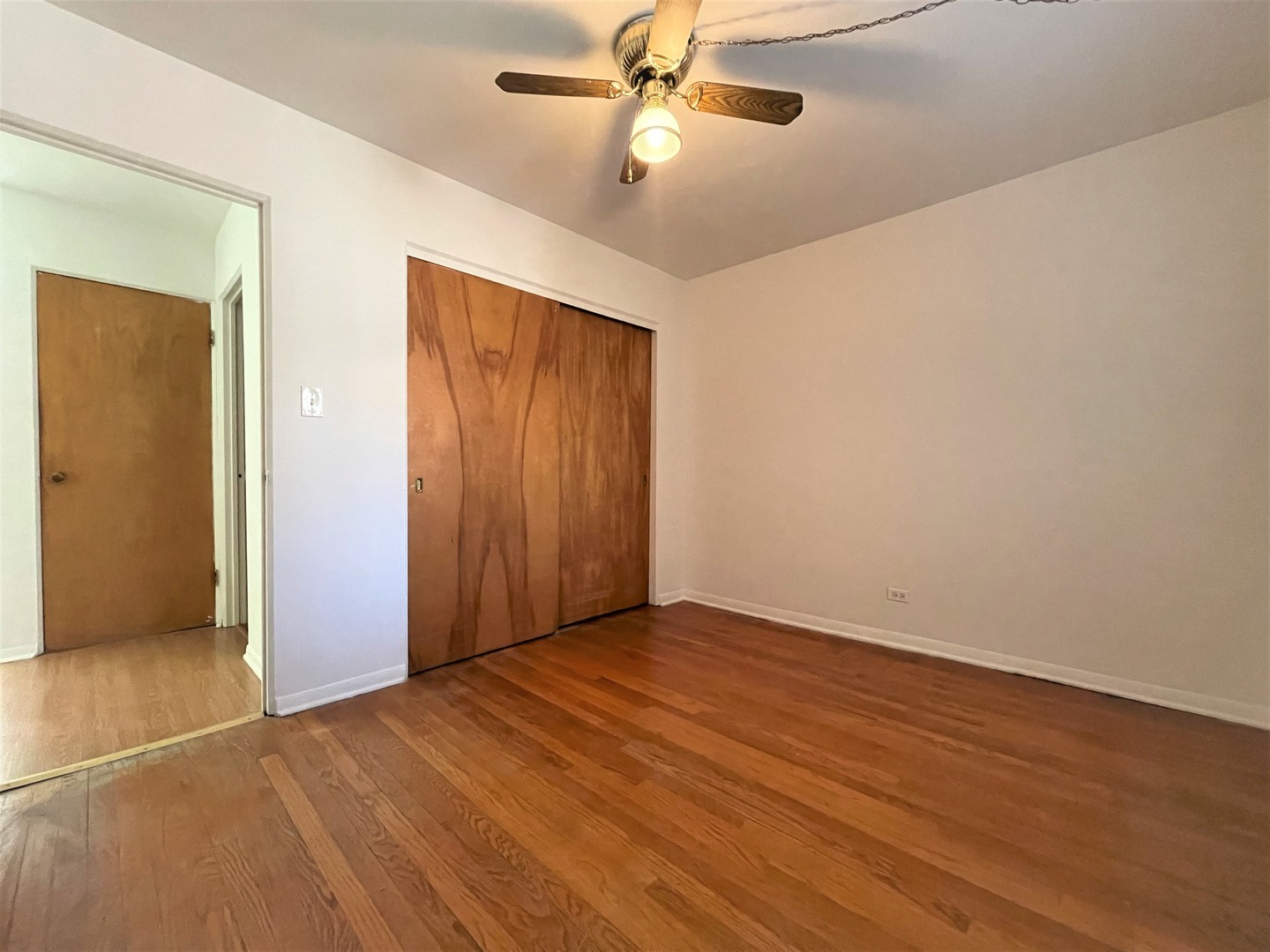 341 Custer Avenue, Unit 2 Evanston, IL 60202 - Photo 13 of 19 wooden floor in an empty room