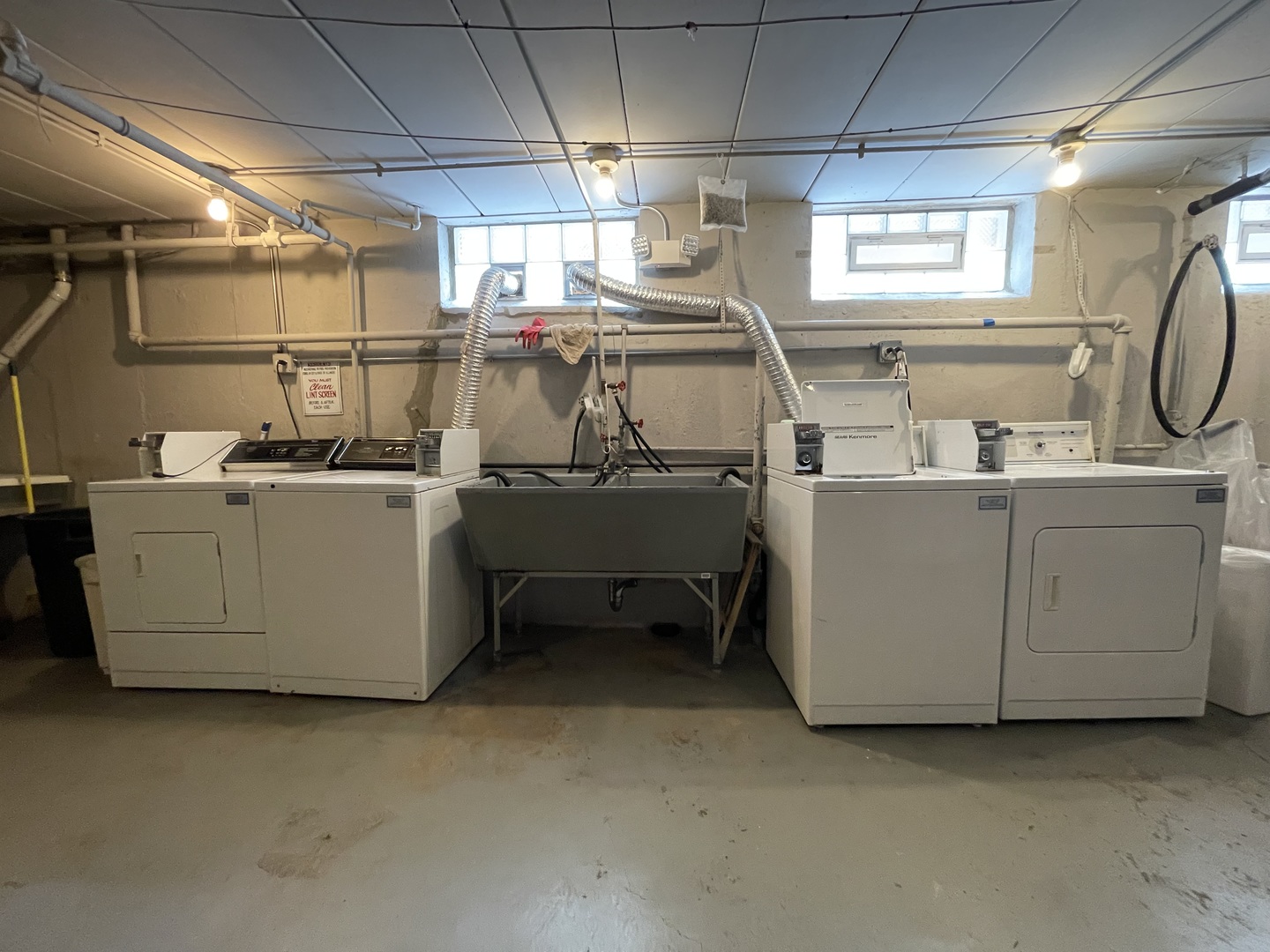 341 Custer Avenue, Unit 2 Evanston, IL 60202 - Photo 17 of 19 a utility room with dryer and washer