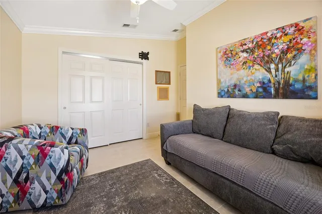 a living room with furniture and a couch