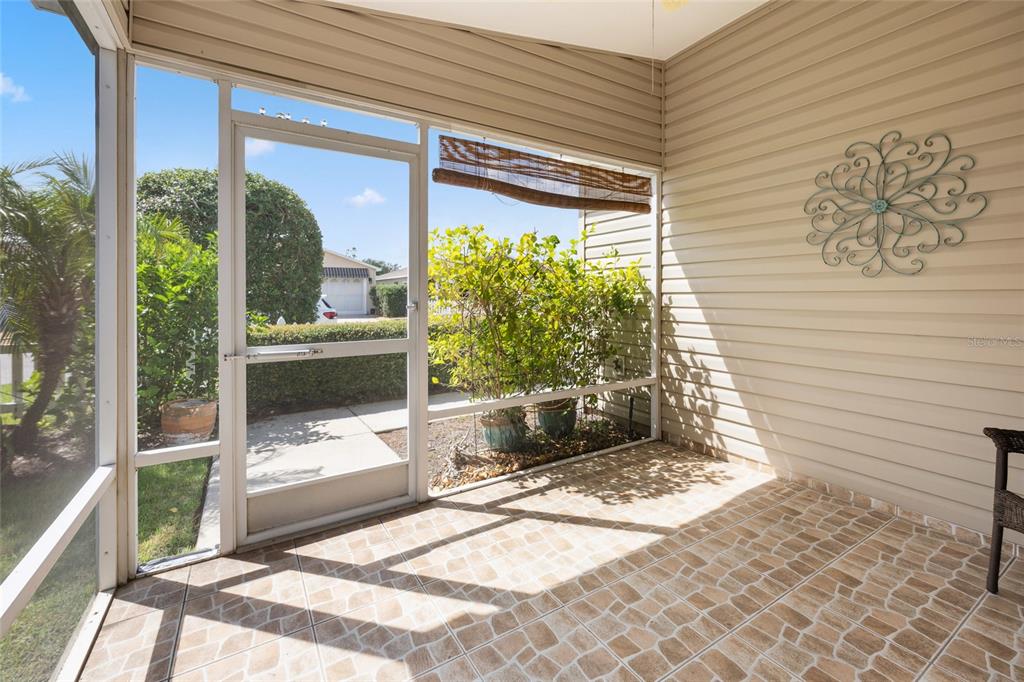 2372 Travis Place The Villages, FL 32162 - Photo 21 of 33 a view of porch with a bench
