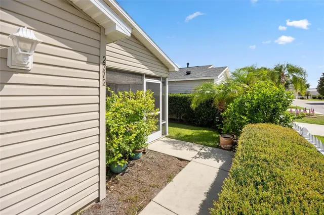 a view of a back yard of the house