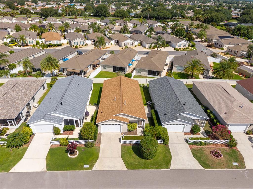 2372 Travis Place The Villages, FL 32162 - Photo 25 of 33 an aerial view of residential houses with outdoor space