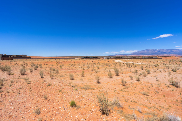 3306 South Endless Trail, Unit 33 Hurricane, UT 84737 - Photo 7 of 27 Expansive desert landscape with a clear blue sky
