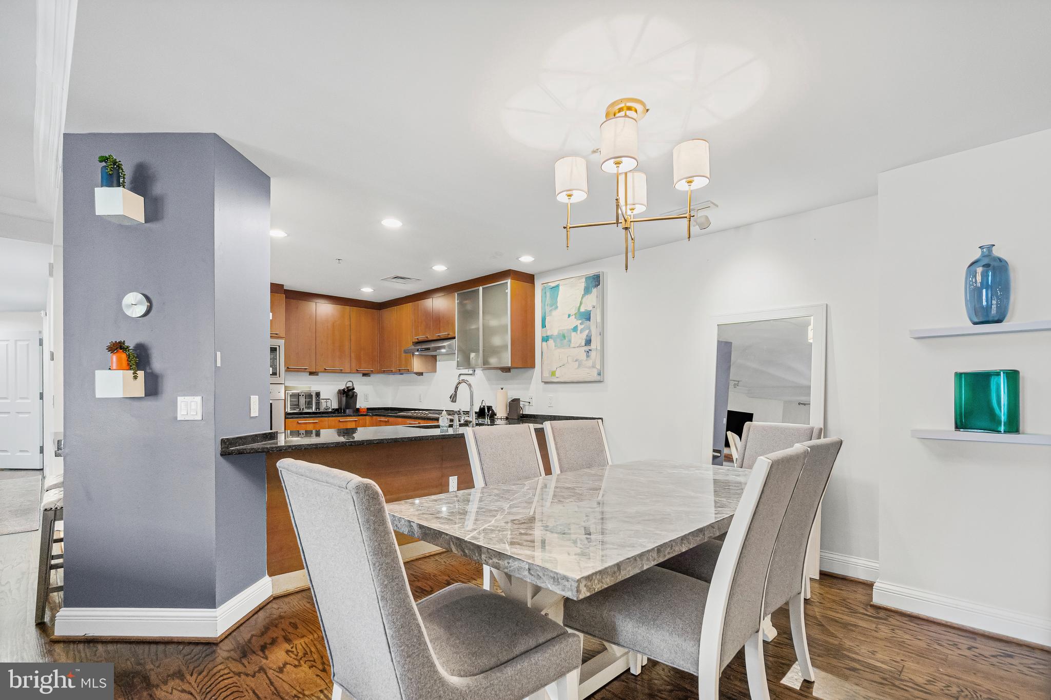 801 Key Highway, Unit 345 Baltimore, MD 21230 - Photo 12 of 57 a view of a dining room with furniture