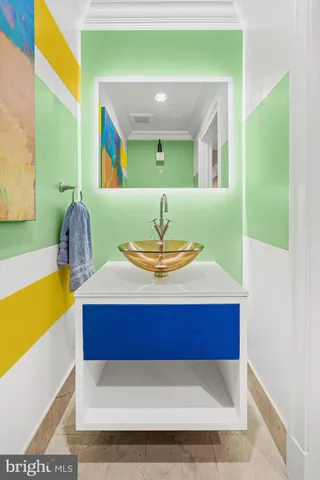 a bedroom with a bed and a television