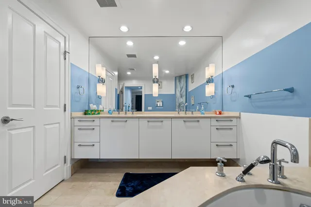 a hallway with storage and utility