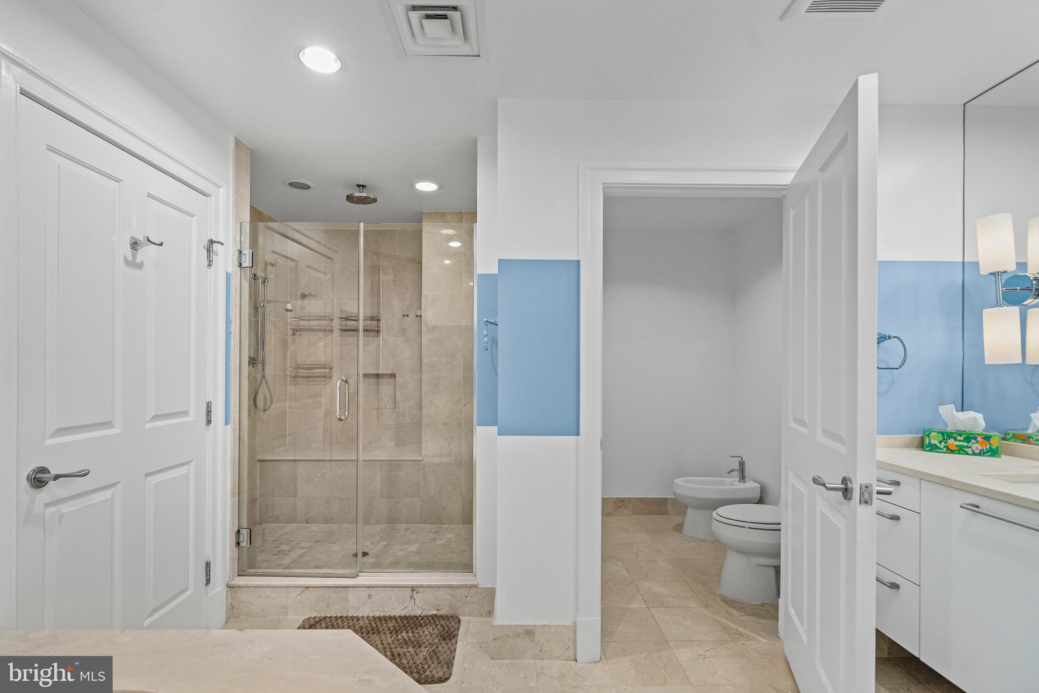 801 Key Highway, Unit 345 Baltimore, MD 21230 - Photo 26 of 57 a bathroom with a shower toilet and sink