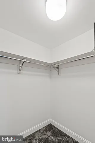 a view of a room with outdoor seating