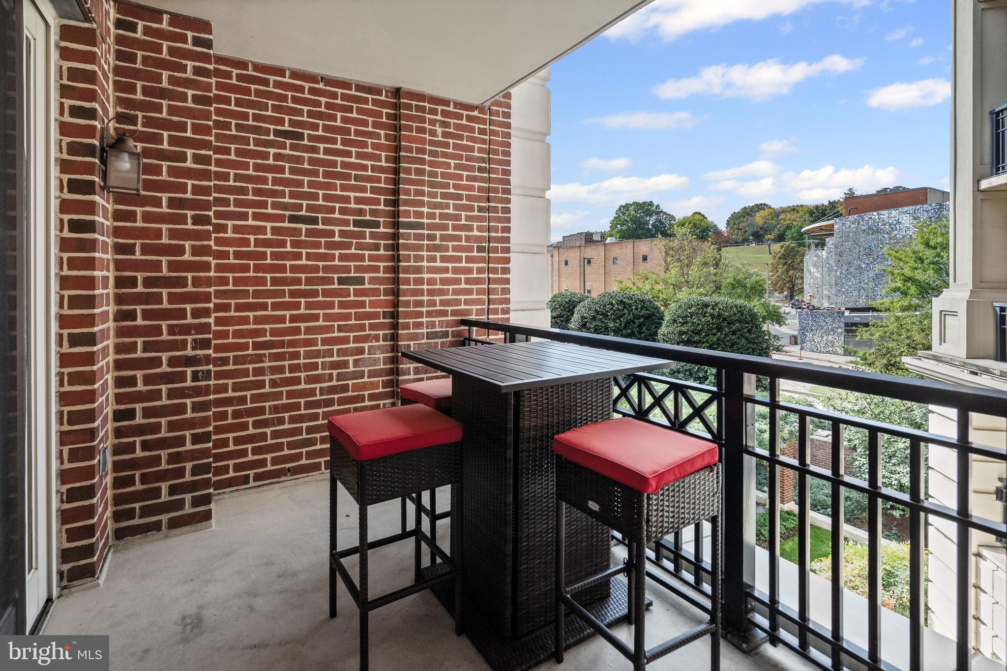 801 Key Highway, Unit 345 Baltimore, MD 21230 - Photo 41 of 57 a view of a balcony with chairs